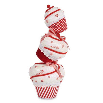 Deko-Figur Turm Kuchen, weiß und rot, mit Streifen und Schneeflocken verziert.